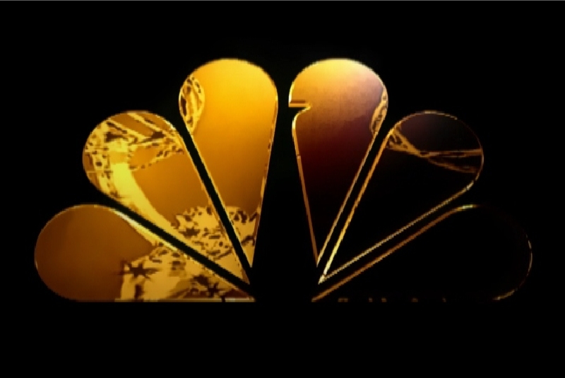 The EMMYs on NBC - Emmy Statuette Reflected in a Golden NBC Peacock Emblem